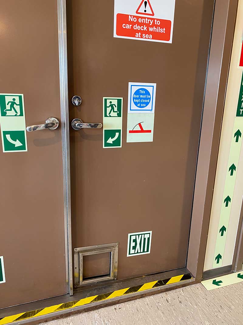 Maine Coon cats: Spotted on the ferry — a cat flap for the ship's cat to go in and out of the cafe!