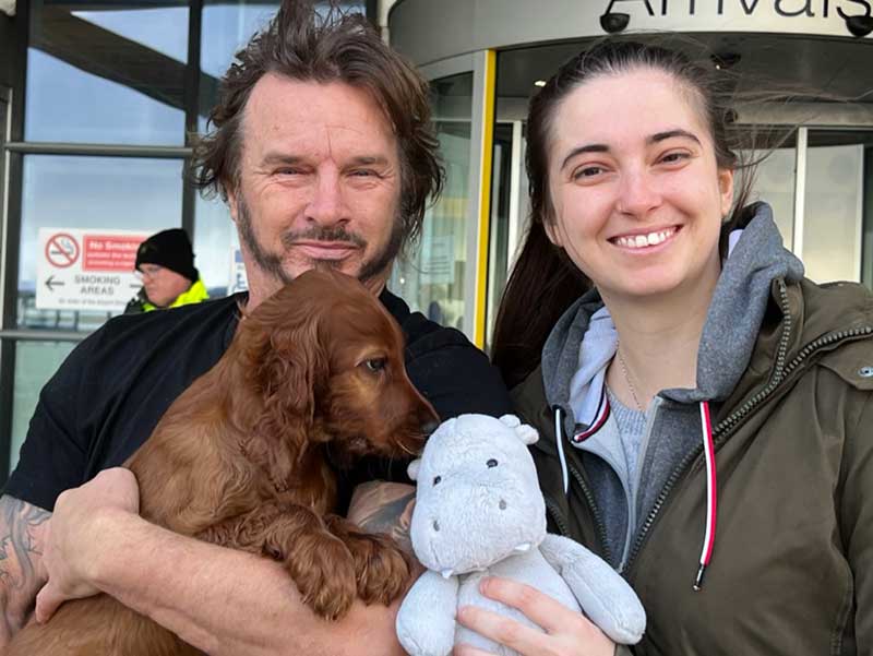 Delighted Geoff and Dani with their new pup