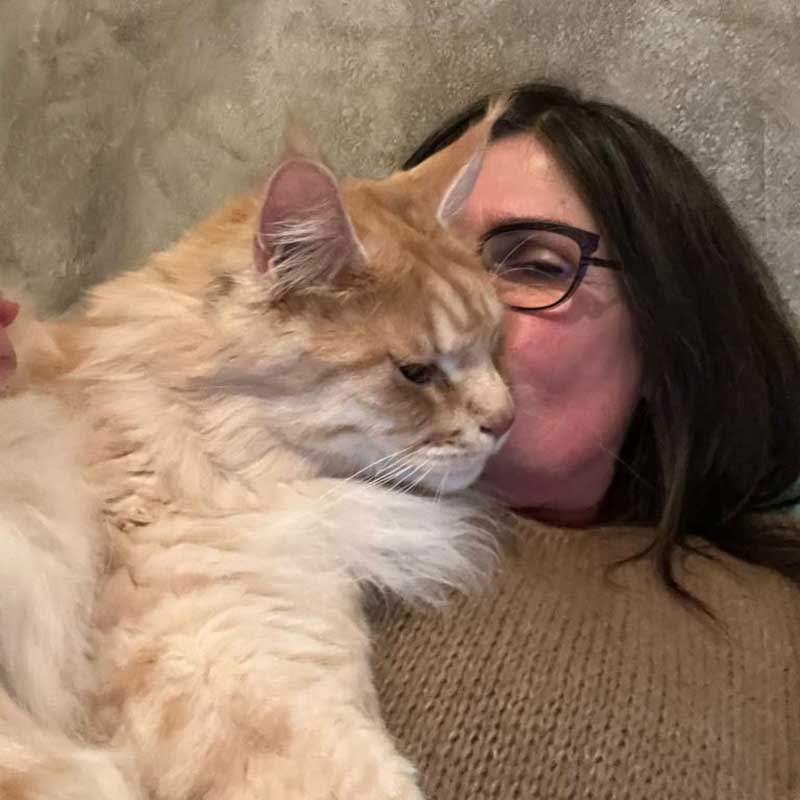 Andrea shared a couple of delightful photos. Here's cuddly Tau...