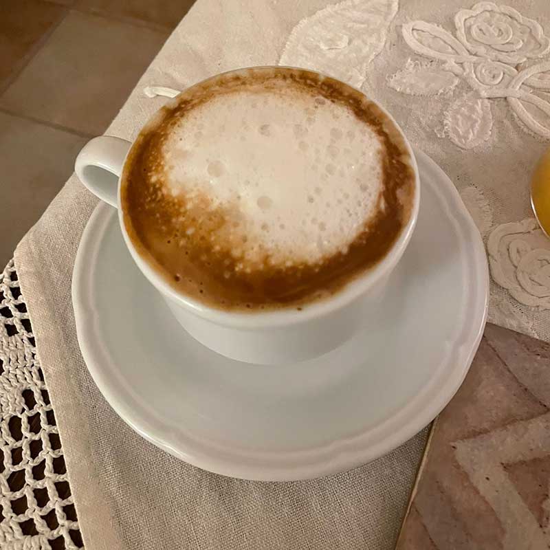 She enjoyed a proper cappuccino at breakfast