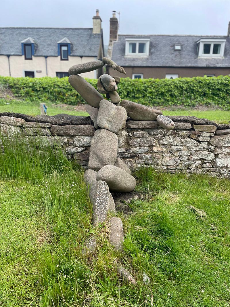 …a rather glamorous stone woman…