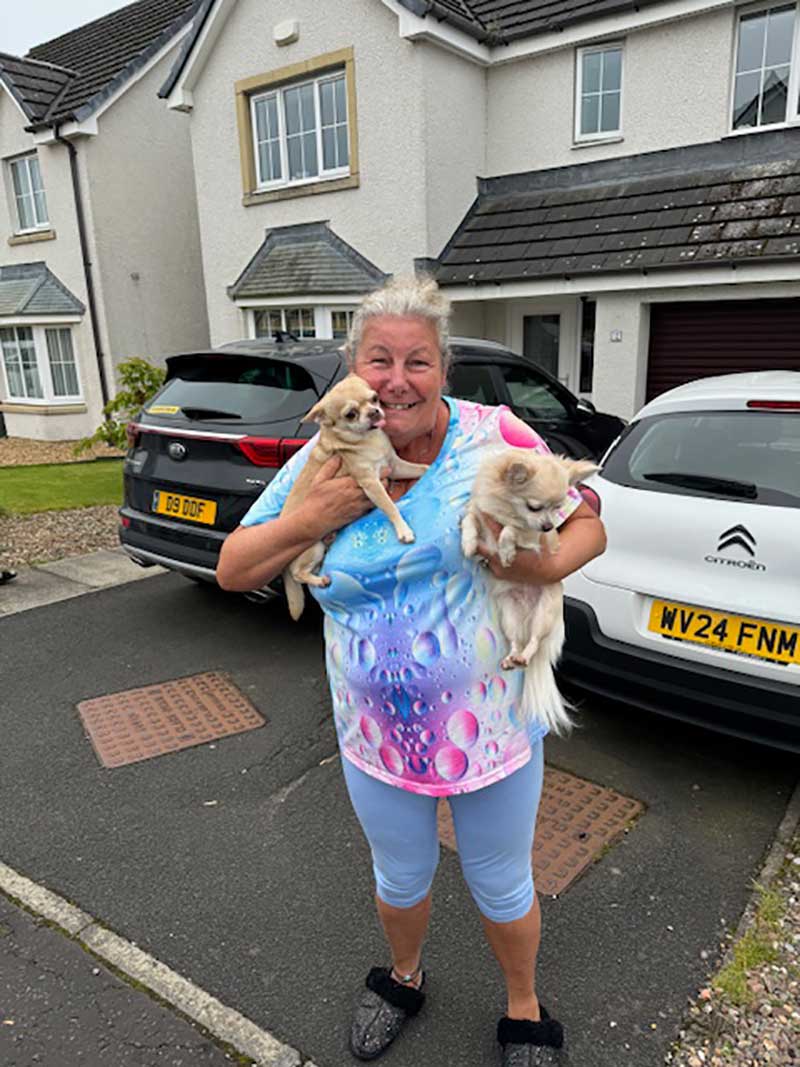 Catherine delighted to have her dogs back in her arms