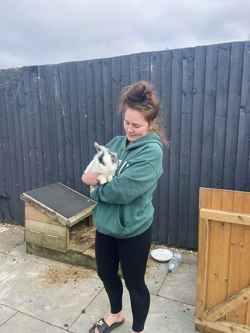Annabel getting the rabbits ready to travel