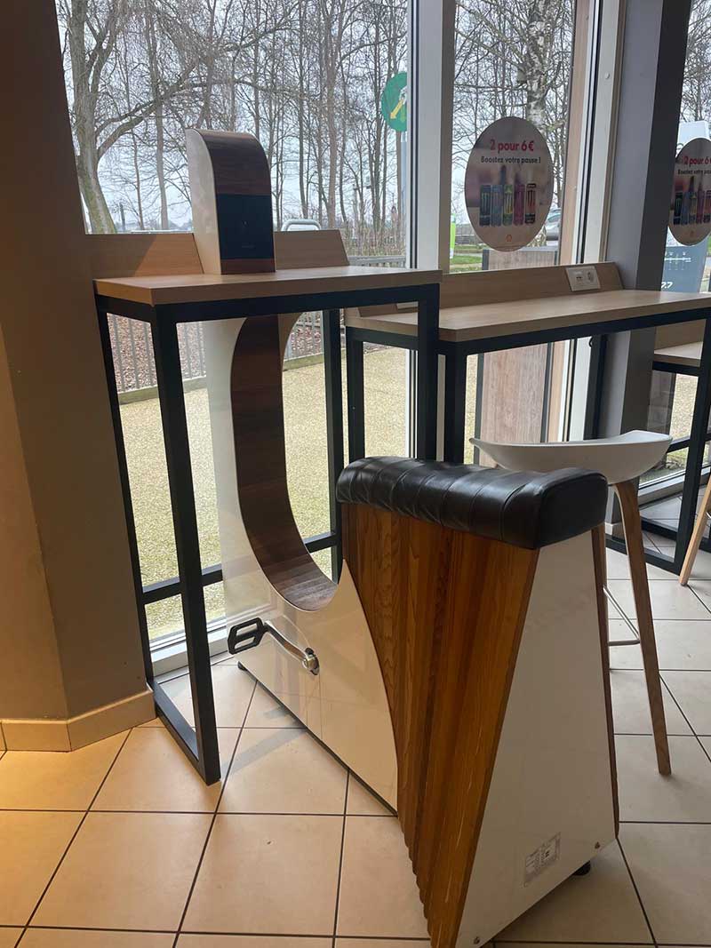 At this service station in France, you can enjoy coffee and a croissant while you pedal to charge up your phone!